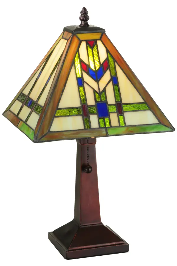 In the tradition of the Prairie School; organic objects were interpreted into geometric forms. Meyda Tiffany uses colorful interlocking blocks of Willow Green; Sunrise Amber and Bark Brown granite glass to form stylized wheat stalks on a Beige Cream background; with Red and Blue accents. Thestained glass shade is perched on a Mahogany Bronze finished base & created using the famous Meyda Tiffany copperfoil construction. The Prairie Wheat Lamp is featured in our American designed handcrafted Mission Lighting Collection. UL and cUL listed for dry locations. Each piece is a unique work of art with color variations based on natural ingredients inherent in the glass. Contact us if color matching is critical when ordering multiple items.