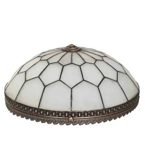 Embrace the timeless look of this classic lighting design. A Clear Frosted hand-curved art glass shade features a Honeycomb pattern enhanced with Brass filigree accents finished in Antique Brass; highlighted to reveal an eye-catching dimensional look. The shade is ideal for pairing with hardware to build ceiling fixtures or with a base to create table or floor lamps. The Vincent Honeycomb Shade is featured in our American-made; American-designed; handcrafted Quality Bent Glass Collection; which is manufactured in Yorkville; New York. The Quality Bent Glass division of Meyda Tiffany has been in the making for over 100 years. The company revolutionized the manufacturing process for high-temperature glass forming by custom building production capacity glass forming ovens and kilns. Today; we are still creating timeless masterpieces using tools and methods from when we supplied Tiffany Studios. - alternate view