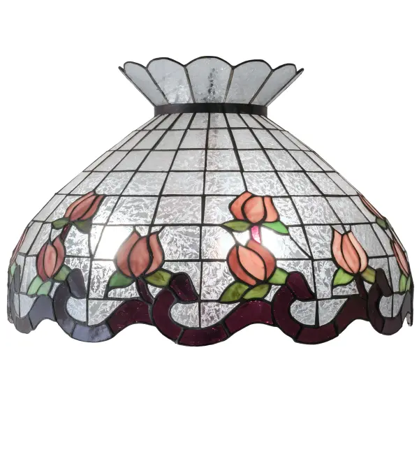 Grace your home with the elegant Roseborder Shade. This exquisitely crowned shade features a gridwork of Clear Fern Glass adorned with a Plum Waterglass border of swirling ribbons and perfect Pink Rosebuds with Green Leaf accents. The art glass shade is made of hand cut glass using the famous Meyda Tiffany copperfoil construction process. Pair with a base to create a beautiful table or floor lamp, or add hardware to build a stunning ceiling fixture. The Cat Shade is featured in our American designed, handcrafted Tiffany Lighting Collection. Each shade is a unique work of art with color variations based on natural ingredients inherent in the glass. Contact us if color matching is critical when ordering multiple items. Collection: Roseborder Glass: Zaz Pa Tac Width: 20.00" Height: 15.00" Length: 20.00" Weight: 9.00 lb Country of Origin: CHINA Safety Listing: Dry Safety Rating: Dry