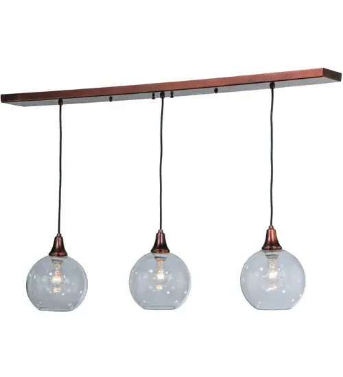 This stunning linear fixture features three Clear Glass Orb-shaped shades complemented with a striking New Copper Vein finish. The overall height ranges from 12 to 71 inches; as the cord lengths can be easily adjusted in the field to accommodate your specific lighting application needs. Ideal for placement above bars; kitchen islands; counters; and dining tables. The fixtures can be installed nationwide in homes and other spaces; from Detroit; Michigan; to Louisville; Kentucky; to Sacramento; California. The Bola 3 Light Island Pendant is included in our American-made; American-designed; handcrafted Modern Lighting Collection and manufactured in Yorkville; New York. UL and cUL listed for dry and damp locations. - alternate view