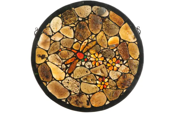 This unique decorative window was inspired by one of Tiffany Studio's most beloved designs; but with a twist. Using hand-picked Agate as a medium; this window is a showstopper. A stunning Red and Amber Agate Dragonfly with Green jeweled eyes swirls around a bunch of Creamy Tangerine Agate flowers. Beige; Gray; Brown and Cream colored Agates create the backdrop. The window is complemented with a border crafted of Black Jadestone. The window includes hanging chains.