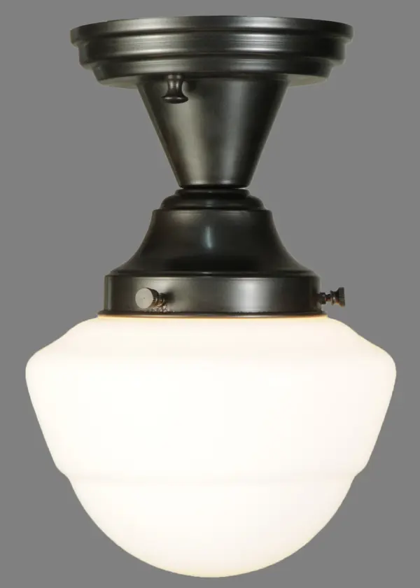 The Revival Schoolhouse glass reflects an authentic classic design. A perfectly formed shade is handcrafted of White Opal Schoolhouse Glass with rich artisanship and style. Originally used in private residences; schools; galleries and libraries; this Schoolhouse electrical reproduction pendant is stem hung and will illuminate a broad range of interiors today. The Brass pendant is enhanced with a Craftsman Brown finish and provides ambient lighting. The Revival Schoolhouse Semi-Flushmount is featured in our American-designed; handcrafted Schoolhouse Lighting Collection. UL and cUL listed for dry and damp locations.