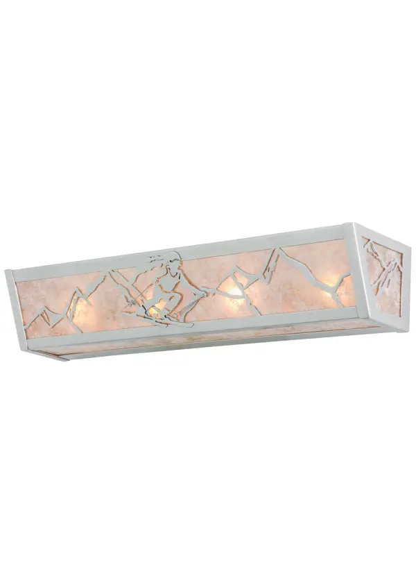 A winter skier sleds down a snow covered mountain on this vanity light; illuminated through Silver mica panels. The fixture has a Nickel finish and is handcrafted in the USA by Meyda artisans.