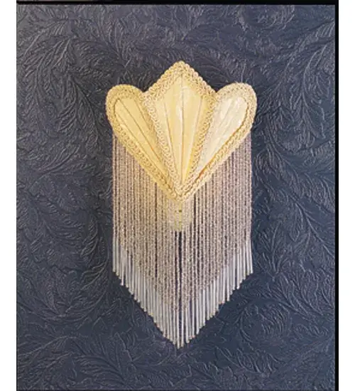 Soft Ivory floral patterned fabric; edged in long strands of real glass beads is draped across a gracefully curving form. This Victorian inspired night light adds a touch of elegance to your darkest night.