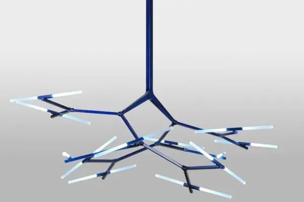 Inspired by modern molecular science Neutron speaks to a complex design of solid steel shapes and Contrail Mist Idalight nanorod lenses. Innovative contemporary work of art integrates advanced fiber optic and LED technologies into a modular form for any environment. Nanorod lenses project cool white luminance and here to True Blue powder coated profile. Versatile arms pivot and rotate. Customizations include canopy or chain mounting. Collection: Neutron Finish: Blue Glass: Contrail Mist Idalight Width: 58.00" Height: 51.00" Length: 67.00" Weight: 20.00 lb Extension from Wall: 6.00" Number of Bulbs: 24 Maximum Wattage: 3.00 W Bulb Type: DIODE Bulb Base: INTEGRAL Light Source: LED Material: Steel Country of Origin: USA Safety Listing: Damp Safety Rating: Damp Energy Efficient LED