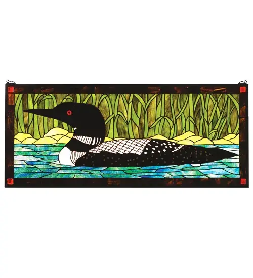 A Black and White loon floats on sparkling Turquoise waters beside Marsh Green grasses. This handsome window is handcrafted utilizing the copperfoil construction process and stained art glass encased in a solid brass frame. Mounting bracket and chain are included.