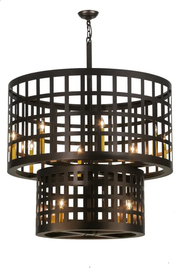 Modern with an industrial twist, this dual layered ceiling pendant will help reimagine your interiors with urban chic. Emancipate your design freedom with this dramatic caged frame and exposed 12 faux candlelights displayed from within. The solid metal hardware and grill are featured in a warm Mahogany Bronze finish. Handcrafted by highly skilled artisans in the USA, this fixture is offered in a myriad of custom lamping options, as well as sizes, designs and finishes. The 40-inch wide pendant is UL and cUL listed for dry and damp locations. Collection: Cilindro Finish: Mahogany Bronze Glass: Black,Amber Mica Width: 40.00" Height: 53.00" Length: 40.00" Weight: 87.00 lb Number of Bulbs: 12 Maximum Wattage: 60.00 W Bulb Type: B10 Bulb Base: E12 Material: Steel Country of Origin: USA Safety Listing: Damp Safety Rating: Damp