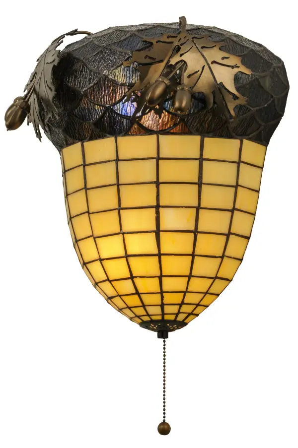 This stunning wall sconce in an Antique Copper finish is as majestic as the mighty oak. The stained glass shade delights with Autumnal Beige Art glass with a Bark Brown and Blue and Purple Granite Textured Glass crown sprouting oak leaf-covered hardware that is handmade by Meyda artisans. The shade is created using the famous Meyda Tiffany copperfoil construction process. This hardwired fixture illuminates with a traditional pull chain. The Greenbriar Oak Wall Sconce is included in our American-made, American-designed, handcrafted Greenbriar Collection and manufactured in Yorkville, New York. UL and cUL listed for dry and damp locations. No two art glass shades will be the same. Collection: Greenbriar Oak Finish: Antique Copper Glass: Stained Glass Width: 12.50" Height: 12.00" Length: 7.00" Weight: 4.50 lb Extension from Wall: 7.00" Number of Bulbs: 2 Maximum Wattage: 60.00 W Bulb Type: A19 Bulb Base: E26 Material: Steel Country of Origin: USA Safety Listing: Damp Safety Rating: Damp
