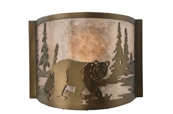 The call of the wild comes to light with a majestic Bear roaming around the woodland lake. Beautiful ambient light shines through the Silver Mica lens while the fixture is enhanced with accents and hardware featured in an Antique Copper finish. The ADA-compliant wall sconce can be installed in dining rooms and entryways in residential, hospitality, and commercial spaces. The Bear at Lake Wall Sconce is featured in our American-made, American-designed, handcrafted Wildlife Lighting Collection. This fixture is manufactured in Yorkville, New York. It is UL and cUL listed for dry and damp locations. Upstate New York's adventurous playland, known as the Adirondack Mountains, with its many breathtaking forests, lakes, and rivers, is the spiritual birthplace of Meyda and inspires our rustic-themed mica collections. Collection: Northwoods Bear At Lake Finish: Antique Copper Glass: Silver Mica Width: 12.00" Height: 9.50" Length: 4.00" Weight: 2.50 lb Extension from Wall: 4.00" Number of Bulbs: 1 Maximum Wattage: 60.00 W Bulb Type: A19 Bulb Base: E26 Material: Steel Country of Origin: USA Safety Listing: Damp Safety Rating: Damp