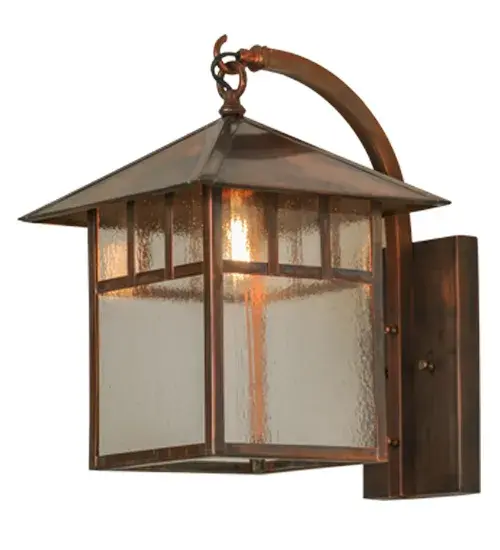 A stunning Craftsman Signature statement emphatically presented with a striking Mission design on this square shaped lantern with a stylized slanted roof.The Solid Brass fixture features Clear Seeded art glass with a frame; roof and hardware in a Vintage Copper finish.Handcrafted by Meyda artisans in the Yorkville; NY manufacturing facilities at the foothills of the Adirondack Mountains. Indoor/Outdoor applications.Custom colors; designs and sizes available. - alternate view
