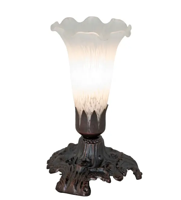 One of the most popular Louis Comfort Tiffany styled lamps on the market today, recreating his famous Favrile design from the early 1900's. This mottled Winter White shaded One Light Accent Lamp offers an attractive, delicate design featuring a shade of mouth blown of fine art glass. Lily shades are seated in an elegant base finished by hand in Mahogany Bronze. Collection: White Finish: Mahogany Bronze Glass: White Width: 4.00" Height: 7.00" Length: 4.00" Weight: 2.00 lb Number of Bulbs: 1 Maximum Wattage: 40.00 W Bulb Type: B10 Bulb Base: E12 Material: Steel Country of Origin: CHINA Safety Listing: Dry Safety Rating: Dry