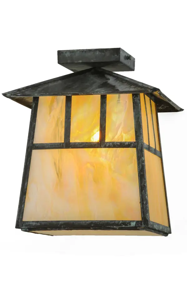Custom made from Solid Brass; a stunning Craftsman Signature design statement is emphatically presented with a striking Mission straight line design on this lantern. Highlighted with Beige Iridescent art glass and a frame and hardware finished in Verdigris. Ideal for indoor and outdoor lighting applications. Handcrafted by Meyda artisans in the Yorkville; NY manufacturing facilities at the foothills of the Adirondack Mountains. Custom colors; designs and sizes available. Indoor and outdoor applications.