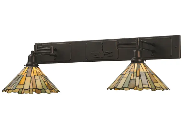 Thinly hand carved and polished natural Jadestone in earthy tones of Moss Green; Tan; Natural Ivory and Coral become luminescent in these unique tile patterned sconce shades and complemented with wall fixture hardware finished in Mahogany Bronze. The natural stone shades are crafted using the famous copperfoil construction process that creates Tiffany stained glass lamps and fixtures. Swing arms extend outward for various task lighting applications.