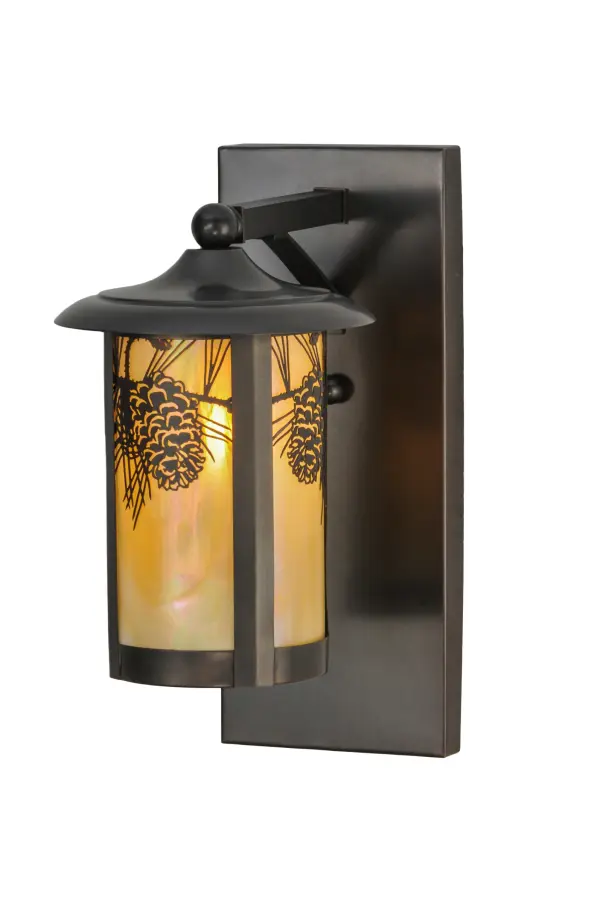 Delicately etched from brass, a stunning pine cone adorns this handsome American Craftsman cylindrical lantern style wall sconce.Inspired by the Arts and Crafts Movement, warm ambient light projects through Beige Iridescent art glass.The fixture is handcrafted in the USA by Meyda artisans and finished in a stunning Craftsman Brown. Custom sizes, styles and colors available. Collection: Fulton Finish: Craftsman Brown Glass: Beige Iridescent Glass Width: 8.00" Height: 15.00" Length: 12.00" Weight: 5.50 lb Extension from Wall: 12.00" Number of Bulbs: 1 Maximum Wattage: 60.00 W Bulb Type: A19 Bulb Base: E26 Material: Brass Country of Origin: USA Safety Listing: Wet Safety Rating: Wet