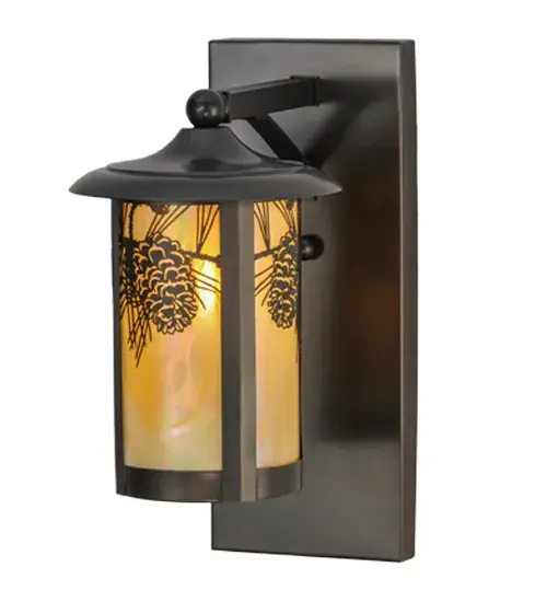 Delicately etched from brass, a stunning pine cone adorns this handsome American Craftsman cylindrical lantern style wall sconce.Inspired by the Arts and Crafts Movement, warm ambient light projects through Beige Iridescent art glass.The fixture is handcrafted in the USA by Meyda artisans and finished in a stunning Craftsman Brown. Custom sizes, styles and colors available. Collection: Fulton Finish: Craftsman Brown Glass: Beige Iridescent Glass Width: 8.00" Height: 15.00" Length: 12.00" Weight: 5.50 lb Extension from Wall: 12.00" Number of Bulbs: 1 Maximum Wattage: 60.00 W Bulb Type: A19 Bulb Base: E26 Material: Brass Country of Origin: USA Safety Listing: Wet Safety Rating: Wet - alternate view