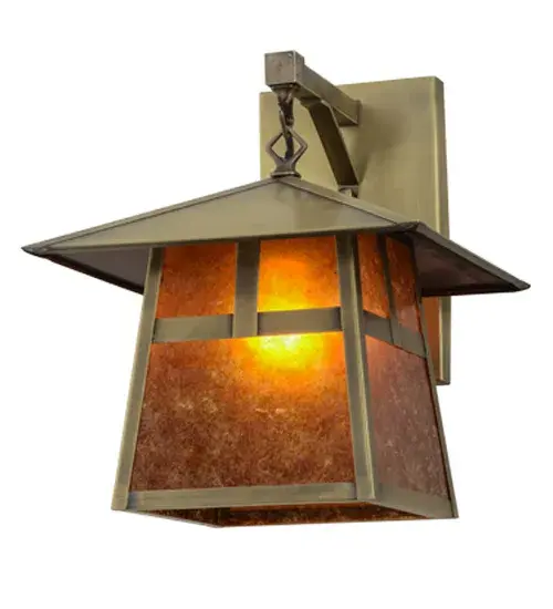 Custom crafted of Solid Brass.A Craftsman Signature lantern inspired by the Arts & Crafts movement. The sconce features a classic ??T?? Mission motif on stunning Amber Mica; complemented with hardware finished in Antique Brass. Perfect for hallways; entryways and covered porches. Custom made by Meyda artisans in our manufacturing facility in Yorkville; New York. Custom sizes; styles and colors. Energy efficient lamping options. - alternate view