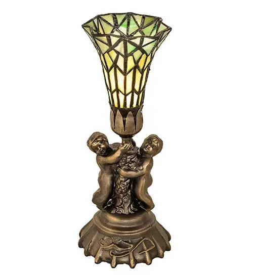 Inspired by the famous Tiffany design from the early 1900s. This mini lamp features a stunning shade created of fine Green art glass using the famous Meyda Tiffany copperfoil construction process. The Pond Lily shade is embraced by an elegant cast base featuring two cherubs finished by hand in Antique Brass. The Pond Lily Table Lamp is featured in our American designed, handcrafted Stained Glass Lighting Collection. UL and cUL listed for dry locations. Each shade is a unique work of art with color variations based on natural ingredients inherent in the glass. Contact us if color matching is critical when ordering multiple items. Collection: Stained Glass Pond Lily Finish: Antique Brass Glass: Green Stained Glass Width: 5.00" Height: 13.00" Length: 5.00" Weight: 2.00 lb Number of Bulbs: 1 Maximum Wattage: 60.00 W Bulb Type: B10 Bulb Base: E12 Material: Zinc Country of Origin: CHINA Safety Listing: Dry Safety Rating: Dry - alternate view
