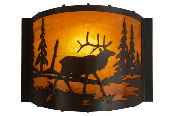Rustic charm is captured beautifully with this majestic Elk walking by a lake in the forest while the morning sun rises in the background of this natural wildlife inspired sconce. Soft ambient light projects through stunning Honey Wispy art glass, which is complemented with a frame and hardware featured in a Timeless Bronze finish. Handcrafted by Meyda artisans in the USA, in our manufacturing facility at the foothills of the Adirondack Mountains. Collection: Elk At Lake Finish: Timeless Bronze Glass: Honey Art Glass Width: 12.00" Height: 9.50" Length: 4.50" Weight: 3.50 lb Extension from Wall: 4.50" Number of Bulbs: 1 Maximum Wattage: 60.00 W Bulb Type: A19 Bulb Base: E26 Material: Steel Country of Origin: USA Safety Listing: Damp Safety Rating: Damp