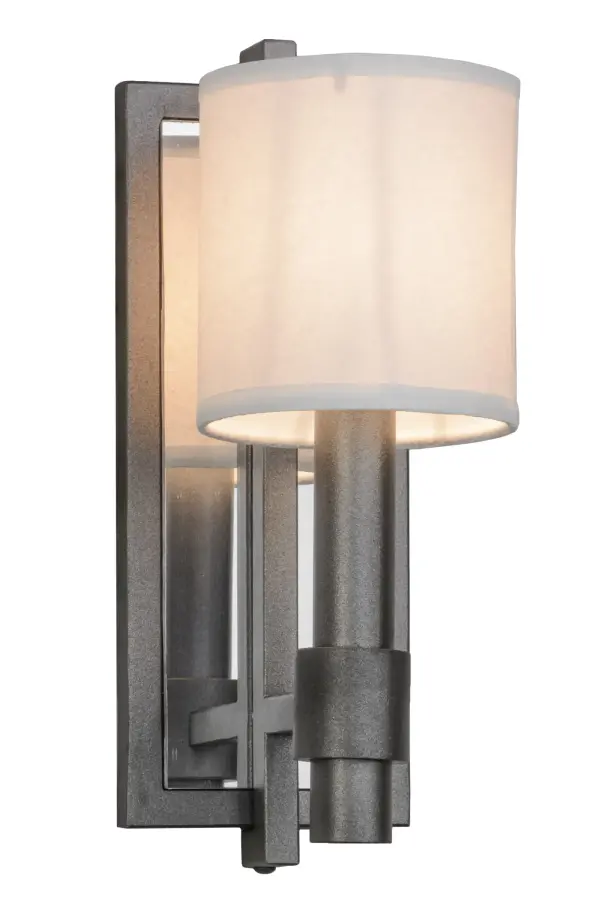 Inviting elegance meets industrial design. A White paper shade tops an industrial styled support attached to a Crystal Idalight mirror backplate finished in Blackened Pewter. Perfect for corridors and entryways in residential, hospitality and commercial interiors. The fixture is handcrafted by master artisans in our 180,000 square foot manufacturing facility in Yorkville, New York. Custom designs, styles, sizes and dimmable energy efficient lamping options are available. UL and cUL listed for damp and dry locations. Collection: Alberta Finish: Blackened Pewter Glass: White Paper And Crystal Idalight Width: 4.00" Height: 11.00" Length: 4.50" Weight: 3.50 lb Extension from Wall: 4.50" Number of Bulbs: 1 Maximum Wattage: 60.00 W Bulb Type: B10 Bulb Base: E12 Material: Steel Country of Origin: USA Safety Listing: Damp Safety Rating: Damp
