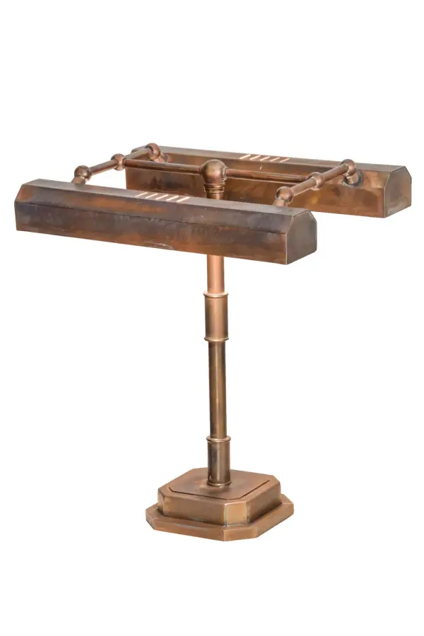 Providing twice the amount of functional illumination with twin heads for reading and work spaces, Fargo offers an authentic style. The Solid Brass Library Lamp is commonly used on a table or desk at which two people can sit across from each other. Handcrafted in the USA and UL and cUL listed, this lamp is available in custom sizes, styles and finishes, and with dimmable energy efficient lamping. Collection: Fargo Finish: Vintage Brass Glass: Lensless Width: 11.00" Height: 16.00" Length: 13.00" Weight: 5.50 lb Extension from Wall: 11.00" Number of Bulbs: 2 Maximum Wattage: 25.00 W Bulb Type: T10 Bulb Base: E26 Material: Steel Country of Origin: USA Safety Listing: Dry Safety Rating: Dry