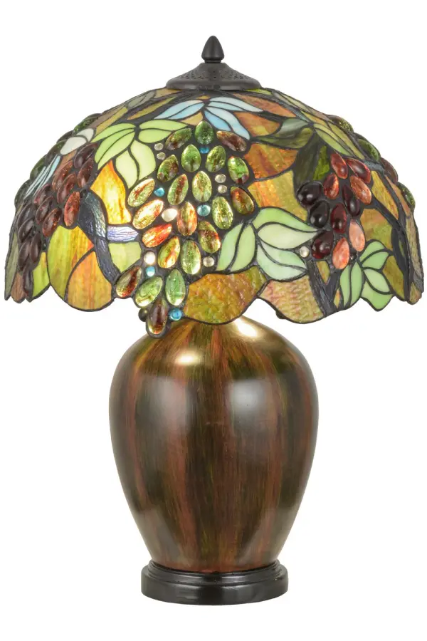 Grape clusters in vibrant colors of Green, Purple, Burgundy, Amber and Orange swirled jeweled glass grow and ripen on Purple/Blue colored vines against a Multicolored background with Clear and Sky Blue glass jewel accents. This stunning shade was created using Meyda Tiffany's famous copper foil construction and complemented with a graceful hand painted and Mahogany Bronze finished table base. Collection: Vinifera Finish: Natural Wood Glass: Ruby,Sunflower,Amber Glass/Acrylic,Green,Blue,Chocolate Width: 16.50" Height: 21.50" Length: 16.50" Weight: 14.00 lb Number of Bulbs: 2 Maximum Wattage: 60.00 W Bulb Type: A19 Bulb Base: E26 Material: Polyresin Country of Origin: CHINA Safety Listing: Dry Safety Rating: Dry