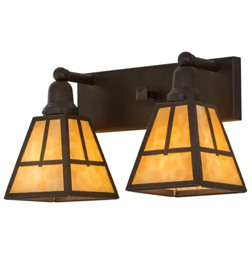 Drawing inspiration from the popular architectural movement from the late 18th and early 19th century Spanish missions in California; this twin-light wall fixture evokes the stylistic revivalism flavor with a minimalist profile and straight line design. Beige art glass shades are complemented with old world hardware that is featured in a stunning Cafe Noir finish. The fixture is perfect for use as a vanity in a bath or as a sconce in hallways and other rooms. Custom crafted in Meyda's manufacturing facility in Yorkville; New York. - alternate view