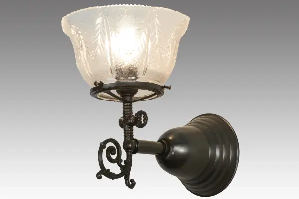 Step back in time with a traditional glass, fit and finish. Reminiscent of lighting fixtures from the early 1900s, the Clear Textured Revival glass shade offers an authentic historic look to complement any room or space. Craftsman Brown finished hardware and accents make this piece a timeless treasure. Handcrafted by Meyda artisans in Yorkville, NY. Collection: Revival Finish: Craftsman Brown Glass: Clear Textured Glass Width: 7.50" Height: 9.00" Length: 10.50" Weight: 2.00 lb Extension from Wall: 10.50" Number of Bulbs: 1 Maximum Wattage: 60.00 W Bulb Type: CA10 Bulb Base: E26 Country of Origin: USA Safety Listing: Damp Safety Rating: Damp