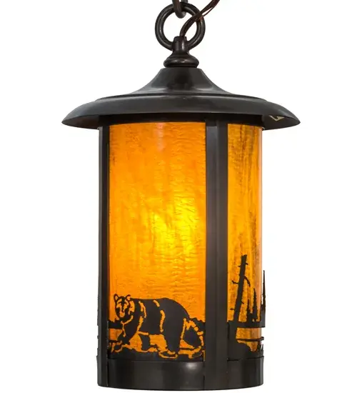 Custom-made from Solid Brass; this mini pendant is constructed for interior and exterior applications. A stunning Craftsman design statement is captured with a dramatic cylindrical profile and a design featuring a majestic Bear meandering along a creek. The Honey art glass diffuser is enhanced with a frame and hardware featured in a Craftsman Brown finish. The mini pendant is ideal for illuminating bars; islands; and tables in timber homes; modern farmhouses; and other spaces. The Fulton Bear Creek Mini Pendant is included in our American-made; American-designed; handcrafted Craftsman Signature Series and manufactured in Yorkville; New York. UL and cUL listed for dry; damp; and wet locations. Our Build Your Own Craftsman Signature Series features unlimited combinations of styles. The collection is called Build Your Own because it is fully configurable and customizable from size and design to finish and lens color. Our Build Your Own Craftsman Signature Series features unlimited combinations of styles. The collection is called Build Your Own because it is fully configurable and customizable from size and design to finish and lens color. Marine-grade; solid brass; or copper raw materials are utilized to ensure items from the Craftsman Signature Series of outdoor and indoor lighting will stand the test of time; as these premium metals are impervious to most types of oxidation. Hand-applied Patina finishes on brass and copper are sealed with a clear varnish and over time; may require gentle maintenance; such as wax; to delay or reverse the natural living finish attributes indicative of this finishing process. Patina finishes on brass and copper provide strong resistance to fading from sun exposure; will not chip or crack; and will not rust like a steel-framed item in the same conditions. Choose from many style options; or send us your concept today! Call today to learn how to use the configuration tool available on our website to generate an item number instantly! - alternate view