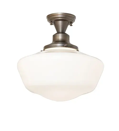 Restore the past with this appealing ceiling fixture featuring a beautifully formed White Opal Schoolhouse Glass shade. The fixture is enhanced with Solid Antique Brass hardware featuring a Hand-Polished Premium Finish. This vintage-style lighting fixture offers a refined yet consistent; distinctive design that originated in traditional schoolhouses and public buildings in the early 1920s. The ceiling fixture is perfect for dining spaces and corridors in structures from Wells; Maine; to Columbia County; New York; to Canaan; Pennsylvania. The Revival Schoolhouse Traditional Globe Flushmount is included in our American-designed; handcrafted Schoolhouse Lighting Collection. The fixture is UL & cUL listed for dry and damp locations. - alternate view