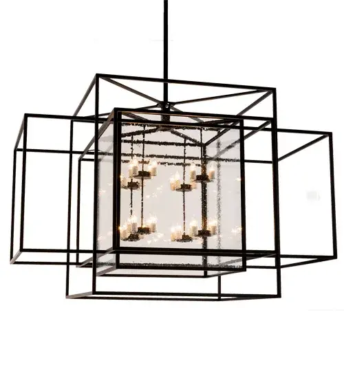 A modern, architecturally styled fixture is designed with a pizazz that is unique, fresh and stylish. Give your decor an extra edge with this innovative fixture featuring a Clear Seeded Glass cube within open frameworks of three larger Solid Steel cages. Suspended inside the cube are 32 faux candlelights. The elaborate frames and hardware are finished in Black. Handmade in our 180,000 square foot manufacturing facility in Yorkville, New York. Dimmable energy efficient lamps, as well as custom sizes, styles and colors, are available. Collection: Kitzi Box Finish: Textured Black Glass: Clear Seeded Glass Width: 54.00" Height: 286.00" Length: 72.00" Weight: 259.00 lb Extension from Wall: 54.00" Number of Bulbs: 32 Maximum Wattage: 25.00 W Bulb Type: CA10 Bulb Base: E26 Material: Steel Country of Origin: USA Safety Listing: Damp Safety Rating: Damp - alternate view