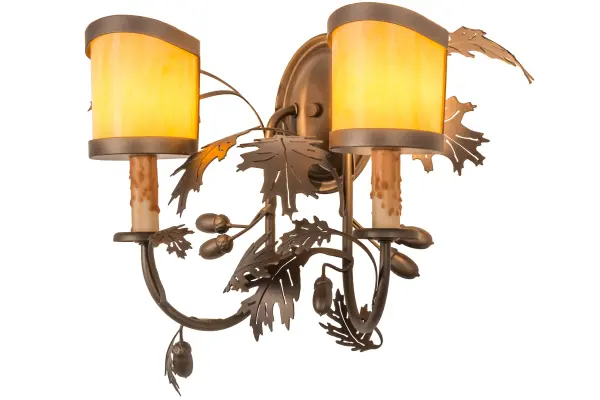 A distinctive charm is revealed with this elegant; nature inspired design as stunning metal Oak leaves; branches and acorns adorn two faux candlelights topped with stylish Tawnyrock Idalight diffusers. The decorative accents and hardware are featured in a Tyler Bronze finish. The most powerful of all trees; the mighty Oak and all of its leaves represent courage and strength. The fixture is handcrafted in our manufacturing facility; at the foothills of the majestic Adirondack Mountains in the USA. Custom colors; styles; sizes and dimmable energy efficient lamping options such as LED are available. UL & cUL listed for dry and damp locations.