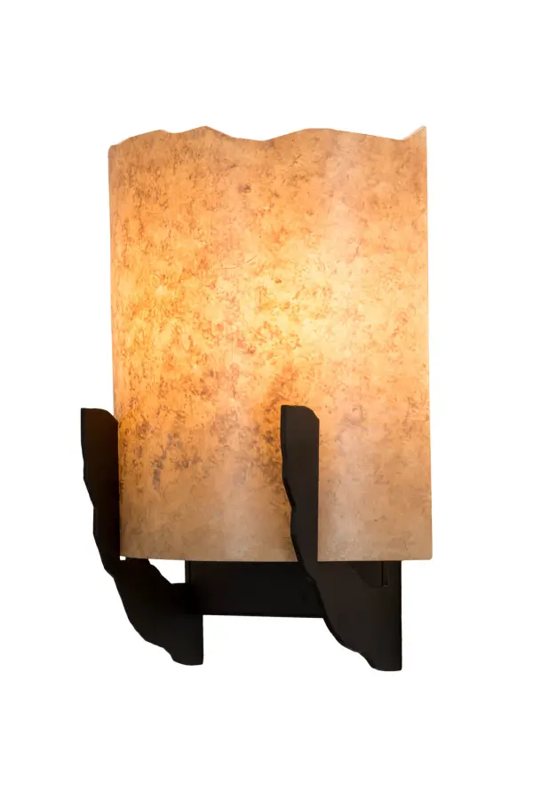 Blending a distinctive style with a stunning textured look, this unique wall sconce reveals an edgy Parchment Idalight diffuser perched on hardware featured in an Oil Rubbed Bronze finish. This sconce, which delivers beautiful ambient lighting, is perfect for corridors in fine homes and hotels, and in other rooms in residential and commercial spaces. Custom crafted by highly skilled artisans in our 180,000 square foot manufacturing facility in Yorkville, New York. Custom colors, styles and sizes are available, as well as dimmable energy efficient lamping options such as LED. UL and cUL listed for damp and dry locations. Collection: Octavia Finish: Oil Rubbed Bronze Glass: Parchment Width: 8.00" Height: 11.00" Length: 4.50" Weight: 2.50 lb Extension from Wall: 4.50" Number of Bulbs: 2 Maximum Wattage: 40.00 W Bulb Type: BA9 Bulb Base: E12 Material: Steel Country of Origin: USA Safety Listing: Damp Safety Rating: Damp