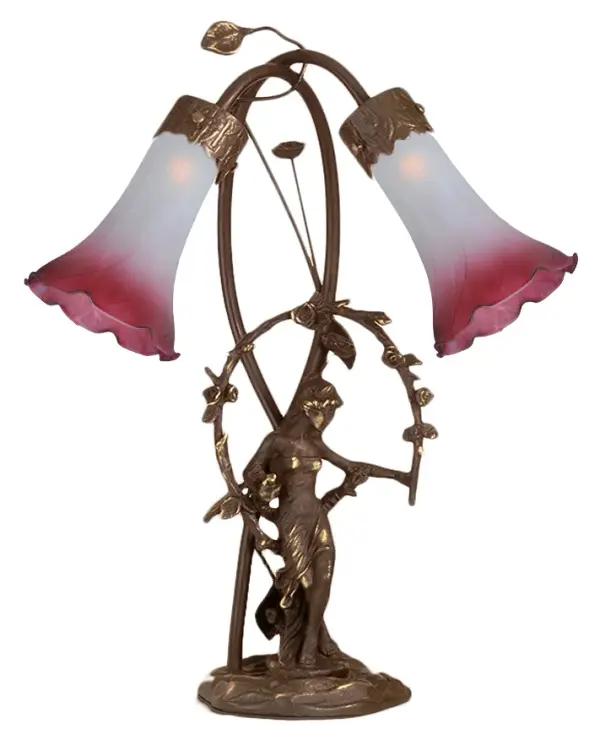 Inspired by Tiffany's famous Pond Lily design from the early 1900s... This table lamp is created with two mouth blown shades featuring Pink and White art glass. The Pond Lily shades are embraced by an elegant Cast Bronze Base featuring a girl under a trellis and finished in a rich Mahogany patina. The Pond Lily Table Lamp is featured in our American designed, handcrafted Favrile Lighting Collection. UL and cUL listed for dry locations. Each shade is a unique work of art with color variations based on natural ingredients inherent in the glass. Contact us if color matching is critical when ordering multiple items. Collection: Pink/White Finish: Mahogany Bronze Glass: Pink/White Width: 15.00" Height: 17.00" Length: 15.00" Weight: 8.00 lb Number of Bulbs: 2 Maximum Wattage: 15.00 W Bulb Type: B10 Bulb Base: E12 Material: Bronze Country of Origin: USA Safety Listing: Dry Safety Rating: Dry