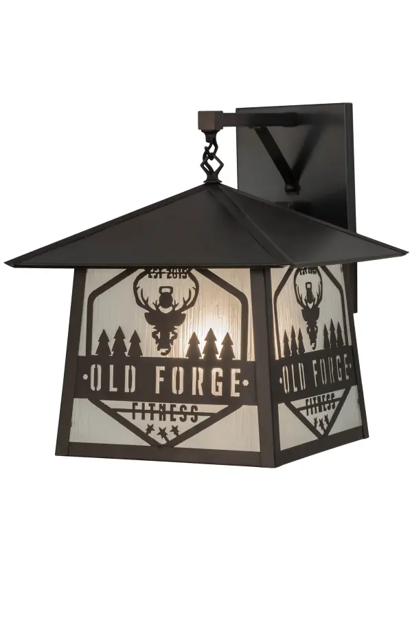 This hanging wall sconce features the Old Forge Fitness name and logo on a Frosted Rainyvue Glass diffuser. This Craftsman styled fixture is created with a Solid Brass frame and hardware in a Craftsman Brown finish. Handcrafted in Upstate New York in the USA; this custom crafted fixture is UL and cUL listed for dry; damp and wet locations. Personalized items are shown as examples of our craftsmanship only and not for sale as is; but can be customized to fit your personal needs.