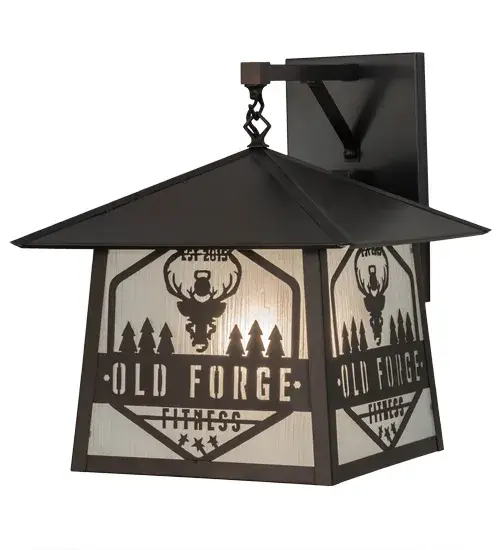 This hanging wall sconce features the Old Forge Fitness name and logo on a Frosted Rainyvue Glass diffuser. This Craftsman styled fixture is created with a Solid Brass frame and hardware in a Craftsman Brown finish. Handcrafted in Upstate New York in the USA; this custom crafted fixture is UL and cUL listed for dry; damp and wet locations. Personalized items are shown as examples of our craftsmanship only and not for sale as is; but can be customized to fit your personal needs. - alternate view