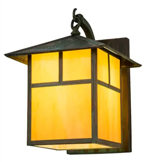Custom crafted of Solid Brass; this Craftsman Signature lantern is inspired by popular American design movements. The sconce features a classic ?T? Mission motif on a stunning Tawnrock Idalight diffuser; which is complemented with hardware and decorative accents featured in a Verdigris finish. The fixture is perfect for a variety of indoor and outdoor applications. The sconce is custom made by Meyda artisans in our manufacturing facility in Yorkville; New York. Custom sizes; styles and colors are available; as well as energy efficient lamping options. The fixture is UL and cUL listed for indoor and outdoor locations. - alternate view