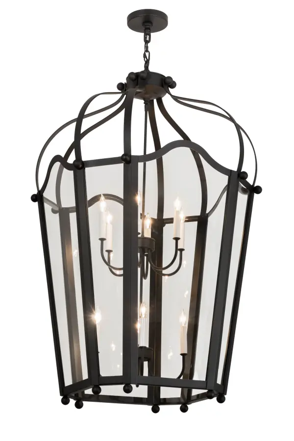 Utilizing a blend of vintage craftsmanship and 21st century technology, the ever-popular Citadel brings home unsurpassed quality and appeal. Evoking a dramatic effect, beautiful ambient light is revealed through Crystal Idalight which is complemented with an appealing design and a frame featured in a Black Textured finish. The fixture reveals a ten light candelabra that illuminates from within and is handcrafted by highly skilled artisans in our 180,000 square foot manufacturing facility in Yorkville, New York. Custom options include various sizes, colors, designs and dimmable energy efficient lamping options. The fixture is UL and cUL listed for damp and dry locations. Collection: Citadel Finish: Textured Black Glass: Crystal Idalight Width: 33.00" Height: 56.00" Length: 28.00" Weight: 67.00 lb Extension from Wall: 28.00" Number of Bulbs: 10 Maximum Wattage: 60.00 W Bulb Type: BA9 Bulb Base: E12 Material: Steel Country of Origin: USA Safety Listing: Damp Safety Rating: Damp