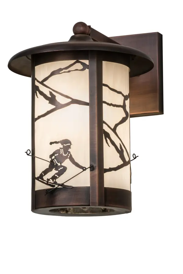 A winter skier slaloming down the slopes is delicately etched of Solid Brass in this compelling design; which features ambient lighting diffused beautifully through White art glass. This compelling Craftsman Signature cylindrical fixture; which is enhanced by a frame and hardware featured in an Antique Copper finish; is perfect as a wall fixture in any room or exterior where you want to make a design statement; whether it is located in a lodge; resort; retailer; home or camp. The sconce is handcrafted in the Meyda manufacturing facility at the foothills of the Adirondack Mountains; not far from Lake Placid; home of the 1932 and1980 Winter Olympics. Custom sizes; styles; colors and dimmable energy efficient lamping options such as LED; are available. This fixture is UL and cUL listed for wet and dry locations.