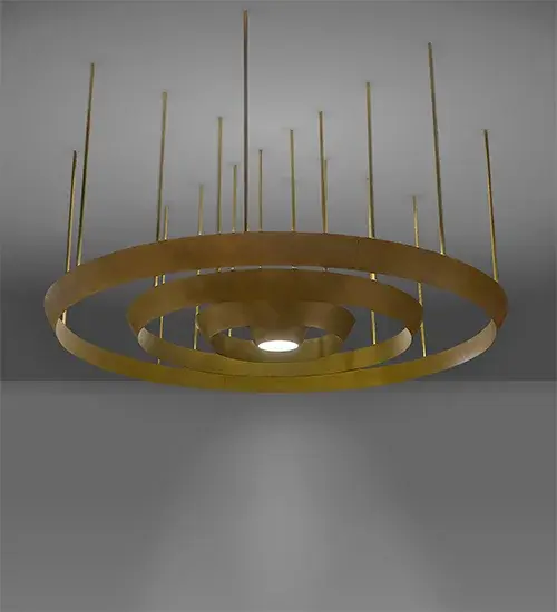 Inspired by the Deco styled engines engineered to propel rockets in vintage sci-fi adventure series; this handsome chandelier features three tapered rings surrounding a downlight which results in a unique intergalactic look. All of the rings and matching hardware are featured in a brilliant Statuary Bronze finish. The fixture includes integral LED uplights and a Clear/Frosted bottom Glass diffuser. Ideal for residential living spaces; conference rooms and lobbies of entertainment companies; hotels and other commercial spaces. Custom crafted in the USA; this luminaire is available in special sizes; finishes; colors and dimmable energy efficient lamping options such as LED. UL and cUL listed for damp and dry locations.