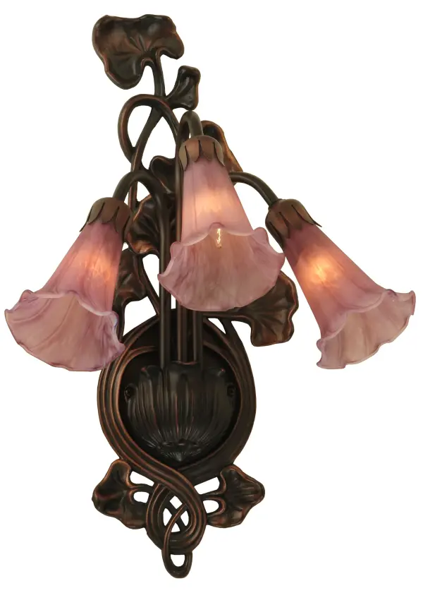 One of the most popular Louis Comfort Tiffany styled lamps on the market today, recreating his famous Favrile design from the early 1900's. This softly mottled Cranberry Red shaded Three Light Wall Sconce offers an attractive, delicate design featuring shades mouth blown of fine art glass. Lily shades are suspended from stems delicately winding above a Lily pads fixture finished by hand in Mahogany Bronze. Collection: Cranberry Pond Lily Finish: Mahogany Bronze Glass: Cranberry Glass Width: 10.50" Height: 17.00" Length: 9.00" Weight: 3.00 lb Extension from Wall: 9.00" Number of Bulbs: 3 Maximum Wattage: 15.00 W Bulb Type: B10 Bulb Base: E12 Material: Zinc Country of Origin: CHINA Safety Listing: Dry Safety Rating: Damp
