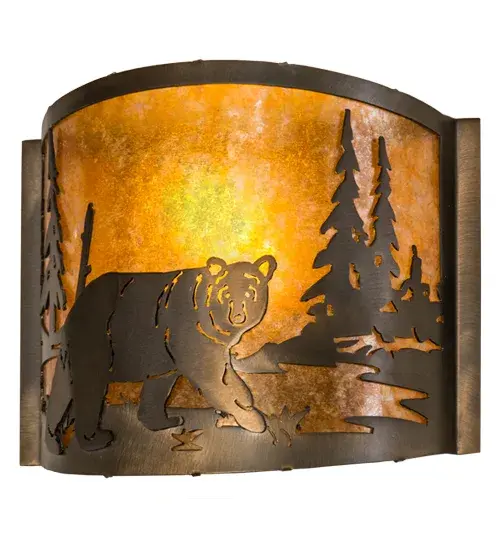 Drawing inspiration from the wildlife and natural beauty in the spectacular American mountain ranges- from New York's Adirondacks; to Big Bend National Park in Texas; to Mount Ranier in Washington. This stunning wall fixture depicts a bold Bear meandering through the woodlands. The stunning Amber Mica shade is enhanced with an Antique Copper finish and will bring the splendor of the wildlife into your home. The ADA-Compliant Wall Fixture is ideal for illuminating walls in corridors and dining areas in residential and hospitality settings. The Lone Bear Wall Sconce is included in our American-made; American-designed; handcrafted Wildlife Collection and manufactured in Yorkville; New York. UL and cUL listed for dry and damp locations. - alternate view
