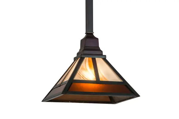 Stunning art glass inspired by the Arts & Crafts movement. The straight lines of this Mission design are featured with Cinnamon Baroque Glass on top and Amber Frosted Fused Glass on the bottom trim. The Solid Brass frame and hardware are featured in a Weathered Antique Brass finish. Align this mini pendant in multiples to create a dramatic design statement over islands, counters, tables, and bars. The pendant is handcrafted by highly skilled artisans in our 180,000 square foot manufacturing facility in Yorkville, NY. Custom sizes, styles, colors and dimmable energy efficient lamping options such as LED are available. UL and cUL listed for damp and dry locations. Collection: T" Mission" Finish: Chemical Antique Brass Glass: Cbr/Double Medium Amber (Inside Frosted) Width: 13.25" Height: 36.00" Length: 9.50" Weight: 5.25 lb Number of Bulbs: 1 Maximum Wattage: 60.00 W Bulb Type: A15 Bulb Base: Medium Material: Steel Country of Origin: USA Safety Listing: Wet Safety Rating: Wet