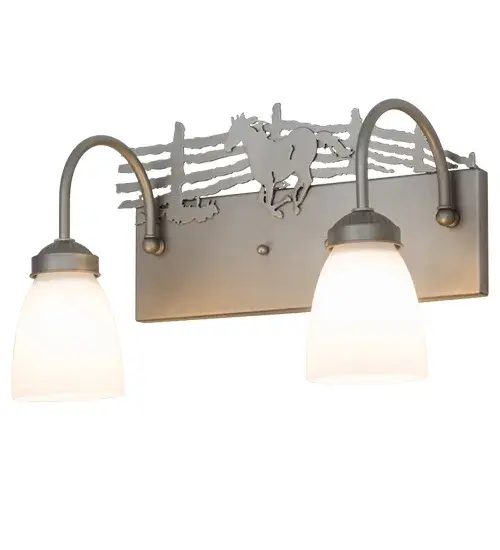 This stunning design features a wild horse galloping around the fencing of a horse stable on the backplate.Beautiful ambient lighting is projected through stunning two dome shaped White glass shades; which are embraced by curved arms.Decorative hardware; frame and accents are enhanced in an Industrial Steel finish.The luminaire is perfect as a vanity light in a bath or a wall sconce in game rooms; man caves and equine/equestrian related businesses.Handcrafted by Meyda artisans in the USA.Custom sizes; styles and colors are available. Energy efficient lamping options such as LED are offered.This fixture is UL and cUL listed for damp and dry locations. - alternate view