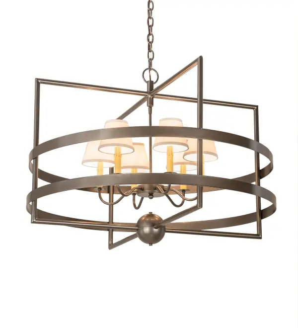 Combining a Grand classic look with industrial styling. The Aldari chandelier features 6 Amber faux candlelights crowned with Cream Linen Shades which provide beautiful ambient lighting from within. A sturdy geometric frame is encircled by two rugged decorative rings for a unique look. The hardware is featured in a Bronze Metallic finish. Ideal for illuminating foyers, living spaces and a variety of other large rooms in residential and commercial settings. Custom crafted by highly skilled artisans in our 180,000 square foot manufacturing facility in Yorkville, New York. UL and cUL listed for dry and damp locations however we do not recommend installing it in spaces that experience a large amount of moisture due to the fabric shades. Collection: Aldari Finish: Bronze Metallic Glass: Cream Linen Width: 36.00" Height: 27.25" Length: 36.00" Weight: 27.00 lb Extension from Wall: 7.50" Number of Bulbs: 6 Maximum Wattage: 25.00 W Bulb Type: B10 Bulb Base: E12 Material: Steel Country of Origin: USA Safety Listing: Dry Safety Rating: Dry