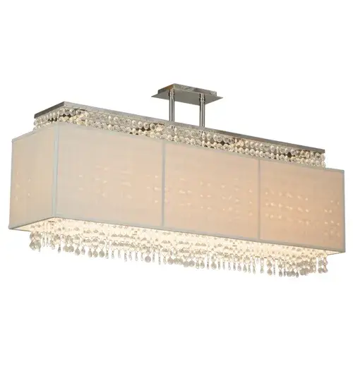 Evoking a look that combines luxury with casual sophistication for your decor; crystal elegance comes to light with the Quadrato Carinthia design. This exquisite oblong pendant features a Sheer Taupe Textrene shade enhanced with a waterfall array of faceted Crystal drops. The frame and hardware are featured in a Chrome Plated finish. The fixture is ideal for illuminating billiard and dining tables; islands; counters and bars. Handmade in the USA; this pendant is available in custom sizes; styles and colors; as well as dimmable energy efficient lamping options such as LED. This order requires a minimum order of 100 pieces. The fixture is UL and cUL listed for damp and dry locations. - alternate view