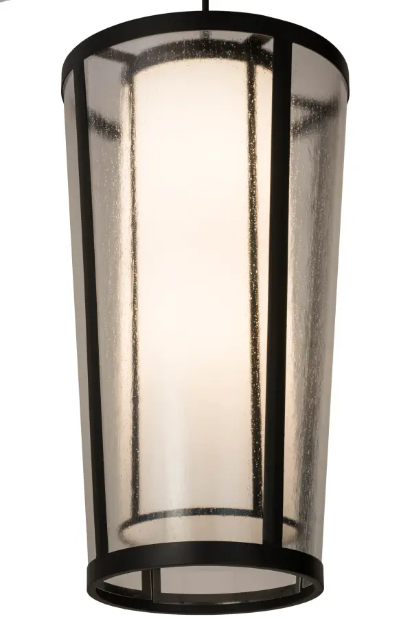 Designed with a curved profile and a striking architectural look; this appealing and versatile ceiling fixture defines a sophisticated aesthetic. This ceiling pendant features a distinctive outer shade with Rainstone Idalight that reveals a Statuario Idalight inner cylindrical diffuser. The hardware is featured in a Textured Black powder coat finish. Handcrafted by highly skilled artisans in our 180;000 square foot manufacturing facility in Upstate NY; this transitional styled pendant is available in a wide range of custom choices including various designs; colors; sizes and dimmable energy efficient lamping options. The 21 inch wide fixture is UL and cUL listed for damp and dry locations.