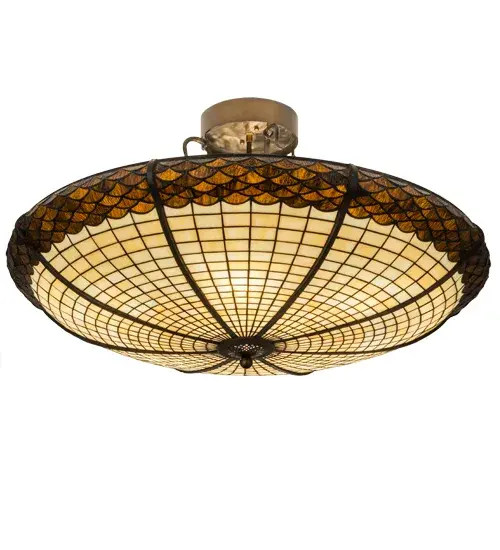 Inspired by the textures and colors of the mighty Oak Tree, this art glass shade is featured in Multi-toned Autumn Beige, and crowned with a scalloped trim in Bark Brown Granite Glass. The shade is created using the famous Meyda copperfoil construction and is complemented with steel hardware and decorative accents featured in an Antique Copper finish. Custom sizes, styles and colors are available, as well as dimmable energy efficient lamping options including LED. The fixture is UL and cUL listed for damp and dry locations. No two art glass shades will be the same as their individuality can be as remarkably unique as their personality. Collection: Greenbriar Oak Finish: Antique Copper Glass: Stained Glass Width: 36.00" Height: 21.00" Length: 36.00" Weight: 30.00 lb Number of Bulbs: 6 Maximum Wattage: 60.00 W Bulb Type: A19 Bulb Base: E26 Material: Metal Country of Origin: USA Safety Listing: Damp Safety Rating: Damp - alternate view