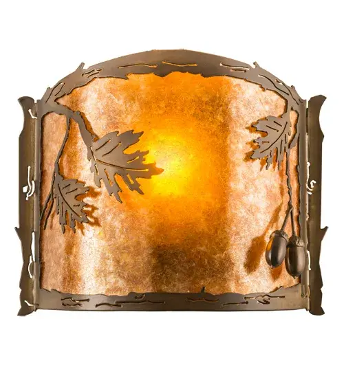 Rustic charm is revealed with this Nature-inspired lighting design as stunning Oak Leaves and Acorns flourish from metal branches that adorn an Amber Mica lens with a Silver Mica bottom diffuser. The ADA-compliant wall sconce is complemented with accents, frame, and hardware featured in an Antique Copper finish. The most powerful of all trees, the mighty Oak represents courage and strength. The curvaceous wall fixture is ideal for illuminating hallways and dining areas in residential and hospitality locations. The Oak Leaf & Acorn Wall Sconce is featured in our American-made, American-designed handcrafted Nature Inspired Collection and is manufactured in Yorkville, New York. UL and cUL listed for dry and damp locations. Collection: Oak Leaf & Acorn Finish: Antique Copper Glass: Amber & Silver Mica Width: 12.00" Height: 9.75" Length: 4.00" Weight: 2.50 lb Extension from Wall: 4.00" Number of Bulbs: 1 Maximum Wattage: 60.00 W Bulb Type: A19 Bulb Base: E26 Material: Steel Country of Origin: USA Safety Listing: Damp Safety Rating: Damp - alternate view