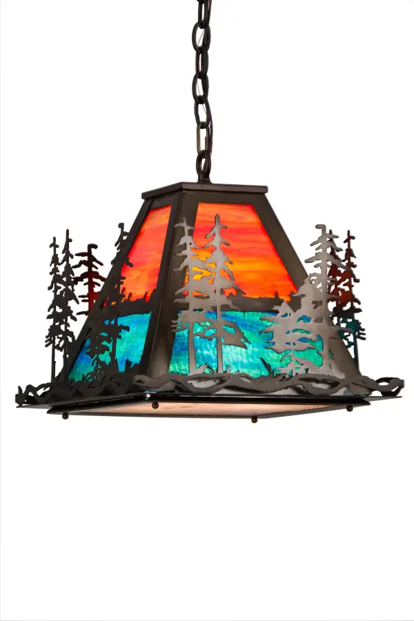 A mesmerizing stand of Tall Pine trees overlooks a picturesque mountain lake featured in Blue-Green art glass; as the warm sun shines in the Sunburst sky. The beautiful shade is complemented with a Silver Mica bottom diffuser. The decorative accents; frame and hardware are featured in an Antique Copper finish. Custom crafted by highly skilled artisans; this pendant is created in our manufacturing facility at the foothills of the spectacular Adirondack Mountains in the USA. Custom styles; sizes and colors are available; as well as dimmable energy-efficient lamping options such as LED. The pendant is UL and cUL listed for dry and damp locations.