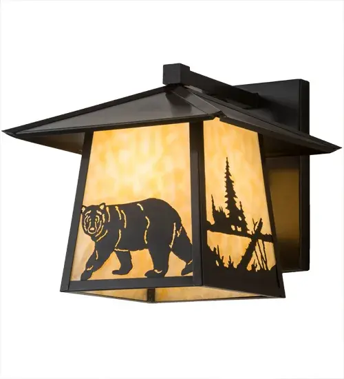 Drawing inspiration from the wildlife and natural beauty in the nearby Adirondack Mountains; this handsome wall sconce depicts a majestic Bear silhouette design on Beige art glass on this Craftsman Signature lantern. The shade is complemented with Solid Brass hardware and decorative accents featured in a Craftsman Brown finish. The fixture is handcrafted by skilled artisans in the USA. Custom designs; finishes; styles; sizes and dimmable energy efficient lamping such as LED are available. The fixture is UL and cUL listed for dry; damp and wet locations. - alternate view